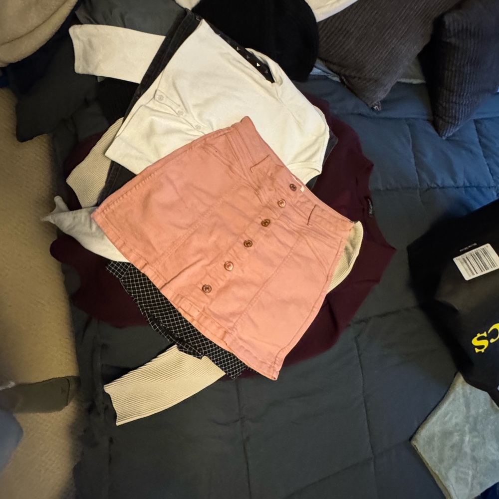 Skirts and tops and dress and a sweater